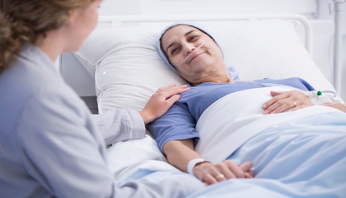 Smiling senior woman with tumor