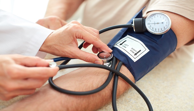 Blood pressure measuring. Doctor and patient.
